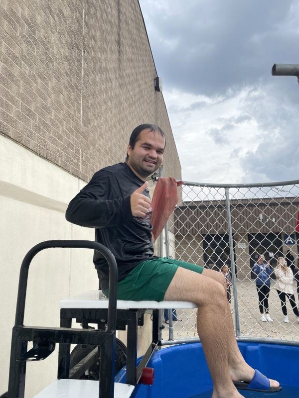Mr. Greanias helps raise funds by sitting in a dunk tank out in the cold!